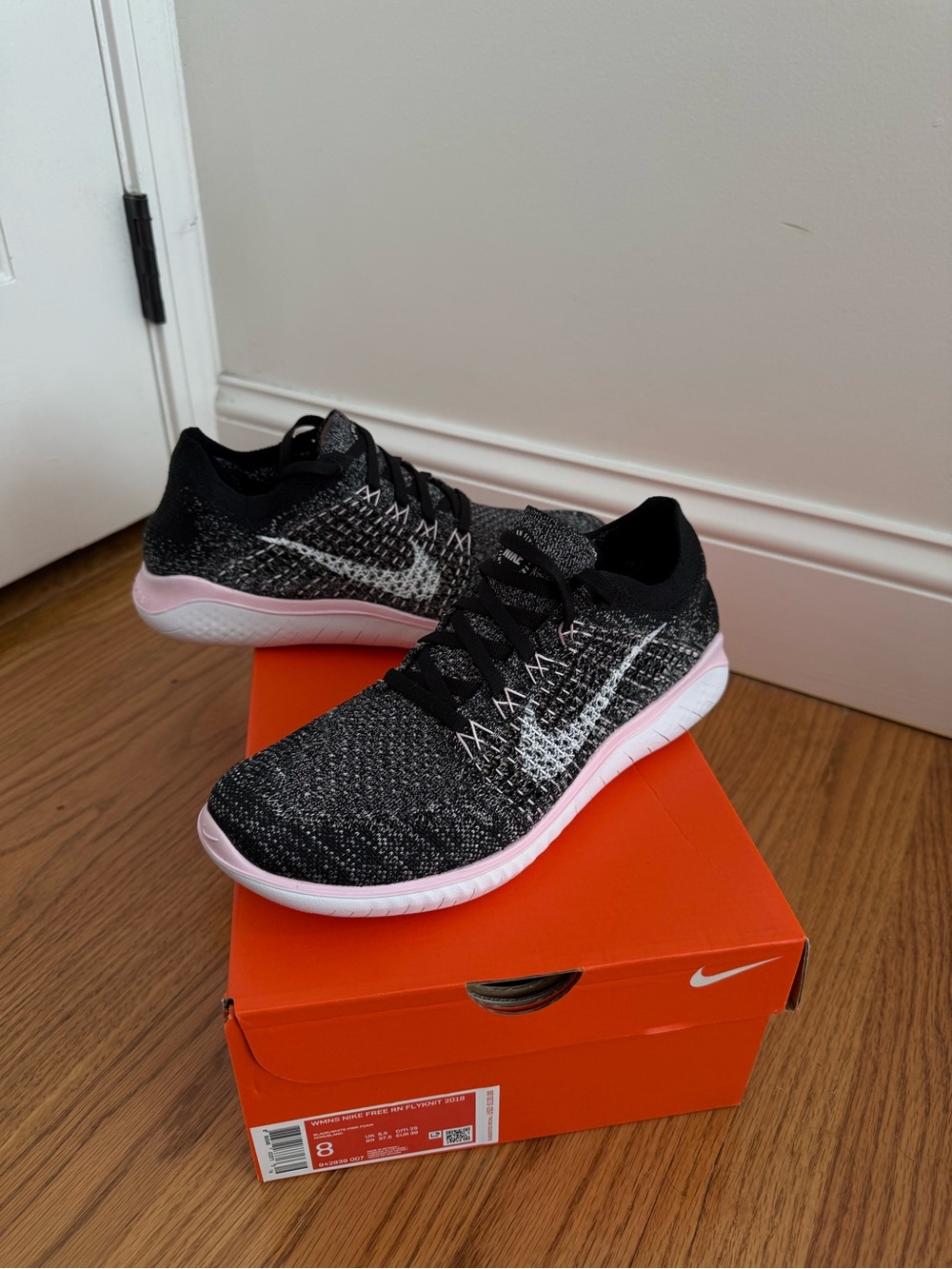 Nike Women's Black/Pink Flyknit Running Shoe